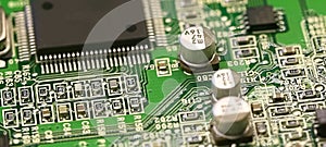 Semi-conductor, electronic and chip located on the green motherboard of the computer