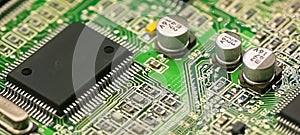 Semi-conductor, electronic and chip located on the green motherboard of the computer