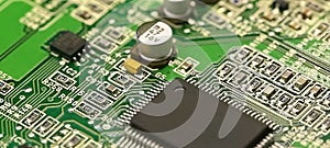 Semi-conductor, electronic and chip located on the green motherboard of the computer