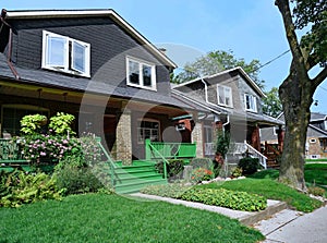 Semi-detached houses with shingled facades