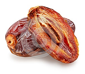 Semi-dried dates and date fruit cut in half isolated on white background. File contains clipping path photo