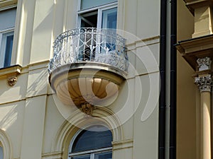 Semi round balcony on old classical european residential building