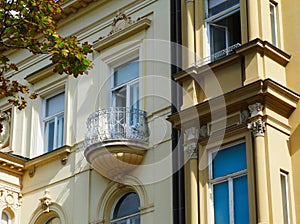 Semi round balcony on old classical european residential building