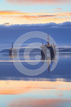 Semi Submersible Oil Rig during Sunrise at Cromarty Firth photo