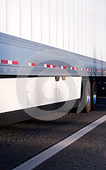 Semi trailer with aerodynamic skirt for fuel savings photo