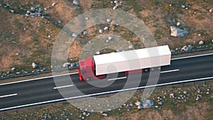 Semi-trailer truck driving along a desert road