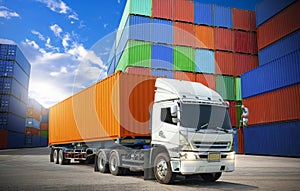 Semi trailer Truck Parked with Row of Stacked Containers Cargo Shipping. Freight Trucks Import-Export. Distribution Warehouse.