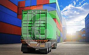 Semi trailer Truck Parked with Stacked of Containers Cargo Shipping. Freight Trucks Import-Export. Distribution Warehouse.