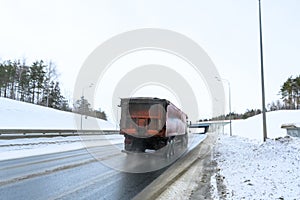 A semi-trailer truck, semitruck, tractor unit and semi-trailer to carry freight.