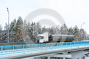 A semi-trailer truck, semitruck, tractor unit and semi-trailer to carry freight.