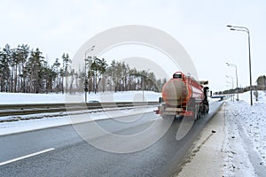 A semi-trailer truck, semitruck, tractor unit and semi-trailer to carry freight.