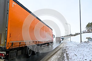 A semi-trailer truck, semitruck, tractor unit and semi-trailer to carry freight.