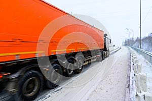 A semi-trailer truck, semitruck, tractor unit and semi-trailer to carry freight.