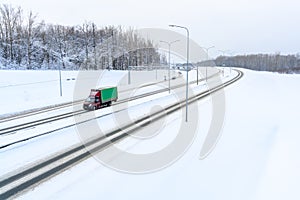 A semi-trailer truck, semitruck, tractor unit and semi-trailer to carry freight.