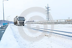 A semi-trailer truck, semitruck, tractor unit and semi-trailer to carry freight.