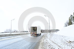 A semi-trailer truck, semitruck, tractor unit and semi-trailer to carry freight.