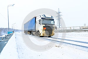 A semi-trailer truck, semitruck, tractor unit and semi-trailer to carry freight.