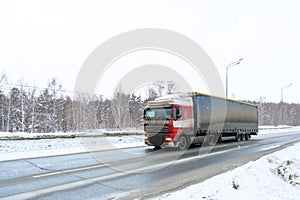 A semi-trailer truck, semitruck, tractor unit and semi-trailer to carry freight.