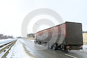 A semi-trailer truck, semitruck, tractor unit and semi-trailer to carry freight.