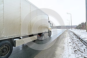 A semi-trailer truck, semitruck, tractor unit and semi-trailer to carry freight.