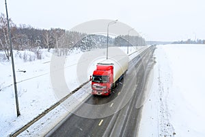 A semi-trailer truck, semitruck, tractor unit and semi-trailer to carry freight.