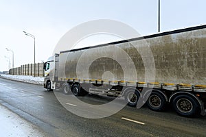 A semi-trailer truck, semitruck, tractor unit and semi-trailer to carry freight.