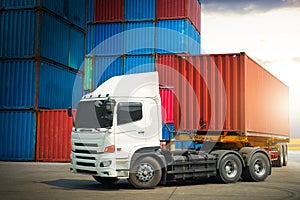 Semi trailer Trucks Parked with Stacked of Containers Cargo Shipping. Freight Trucks Import-Export. Distribution Warehouse.