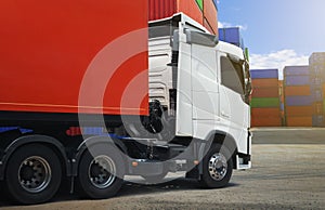 Semi trailer Trucks on The Parking Lot at Port. Containers Cargo Shipping. Cargo Container ships, Freight Trucks Import-Export.