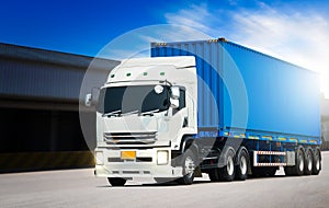 Semi Trailer Trucks on The Parking Lot at Warehouse. Freight Trucks Cargo Transport, Warehouse Logistics.