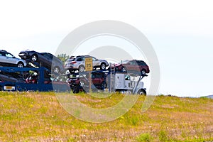 Semi_Truck_classic_car_carrier_with_cars_on_the_trailer