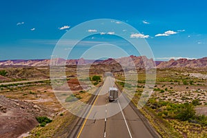 Semi-truck on desert highway in Utah