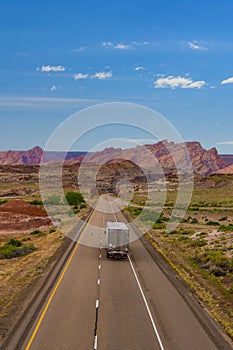 Semi-truck on desert highway in Utah