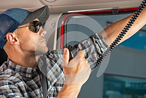 Semi Truck Driver Browsing CB Radio Channels