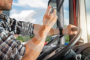 Semi Truck Driver Talking on CB Radio