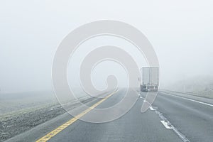Semi-Truck Drives Into Dense Fog