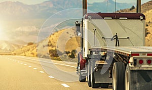 Semi Truck with Flatbed Trailer on a Scenic Utah Road