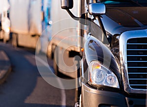 Semi truck in fronf of convoy photo