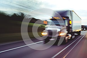 Semi truck on highway concept with motion blur