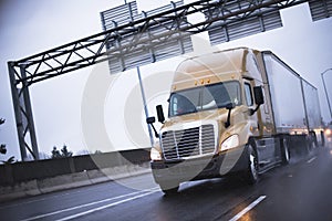 Semi truck in raining highway reflection