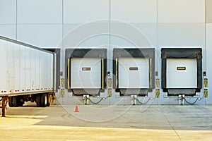 Semi Truck and Warehouse photo