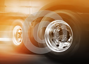 Semi Truck Wheels Spininng, Speed Motion Blur Driving on The Road. Industry Road Freight by Truck. Logistics and Transport concept