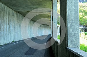 Semi tunnel over road for falling rock protection