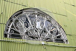 Semicircle shape of sun ray house on the zinc wall