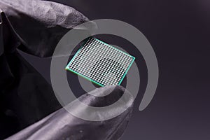 Semiconductor BGA chip in a hand