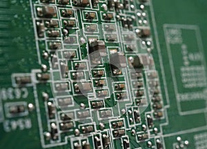 Semiconductor. cpu chip located on the green motherboard of the computer