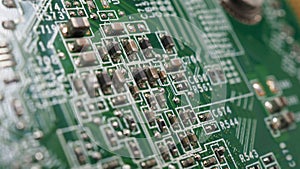 Semiconductor. cpu chip located on the green motherboard of the computer