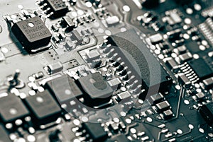 Semiconductors on a circuit board of an industrial control unit photo