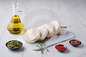 Semifinished beef patties in breading