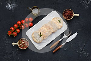 Semifinished chicken cutlet in breading photo