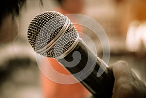 Seminar Conference Concept : hands businesspeople holding microphones for speech or speaking  in seminar room, talking for lecture